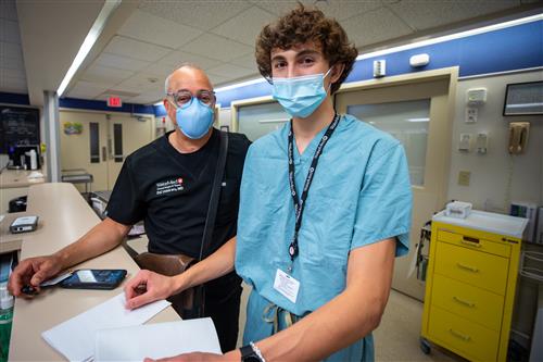 student intern with doctor